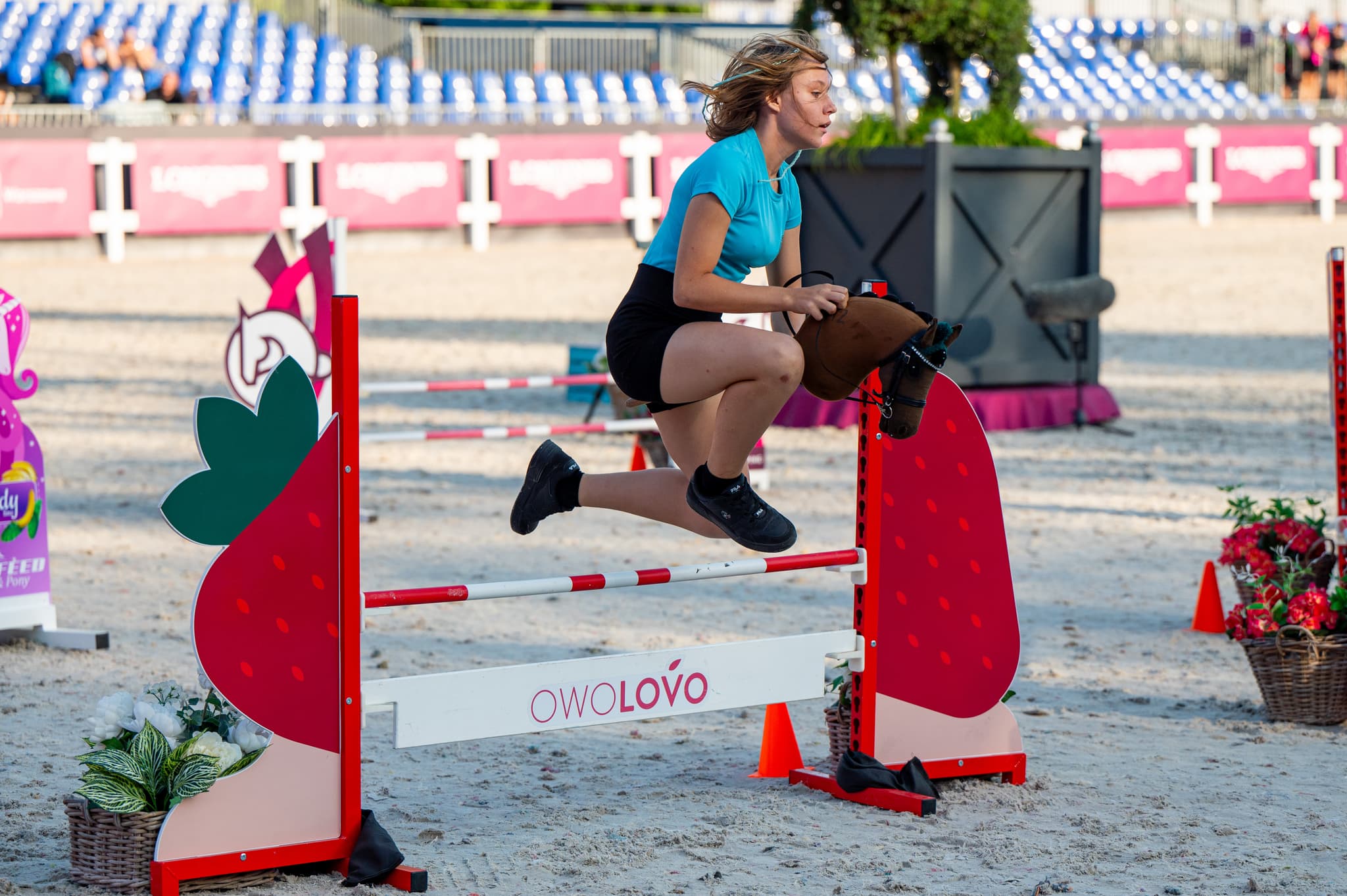 Person riding a hobby horse